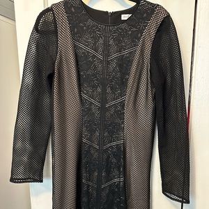 Long sleeved mesh and lace black and tan dress size Large.
